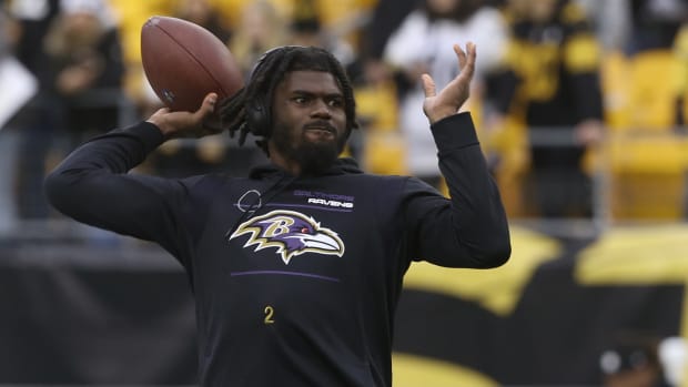 Baltimore Ravens quarterback Tyler Huntley throws the ball during warm ups